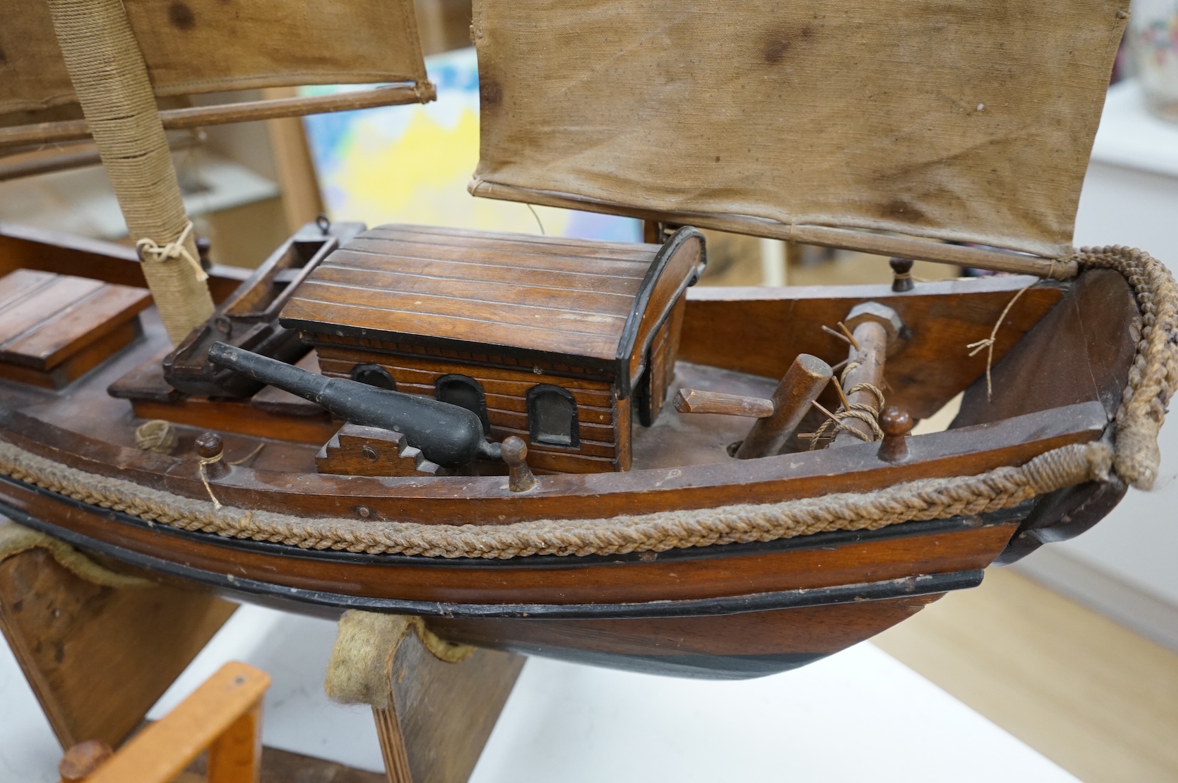 A model of a Chinese junk, a model ship and two other models of boats, largest 71cm in length